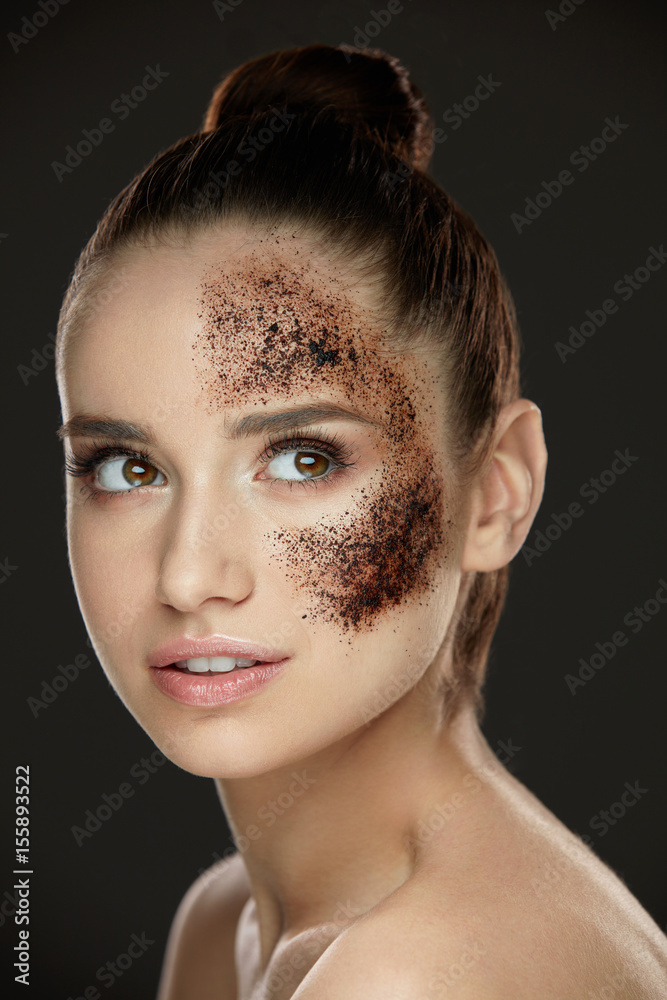 Fototapeta premium Woman Face Skin Care. Girl With Coffee Skin Scrub On Face