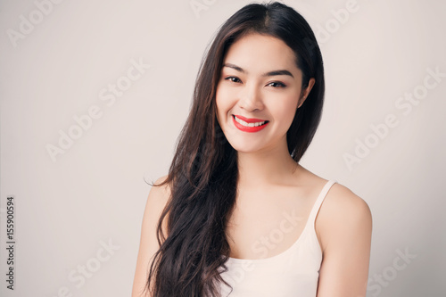 Young beautiful Asian woman with smiley face.