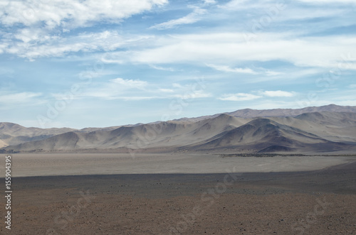 View to brownish dry lands of desert under cloudy sky - stunning view