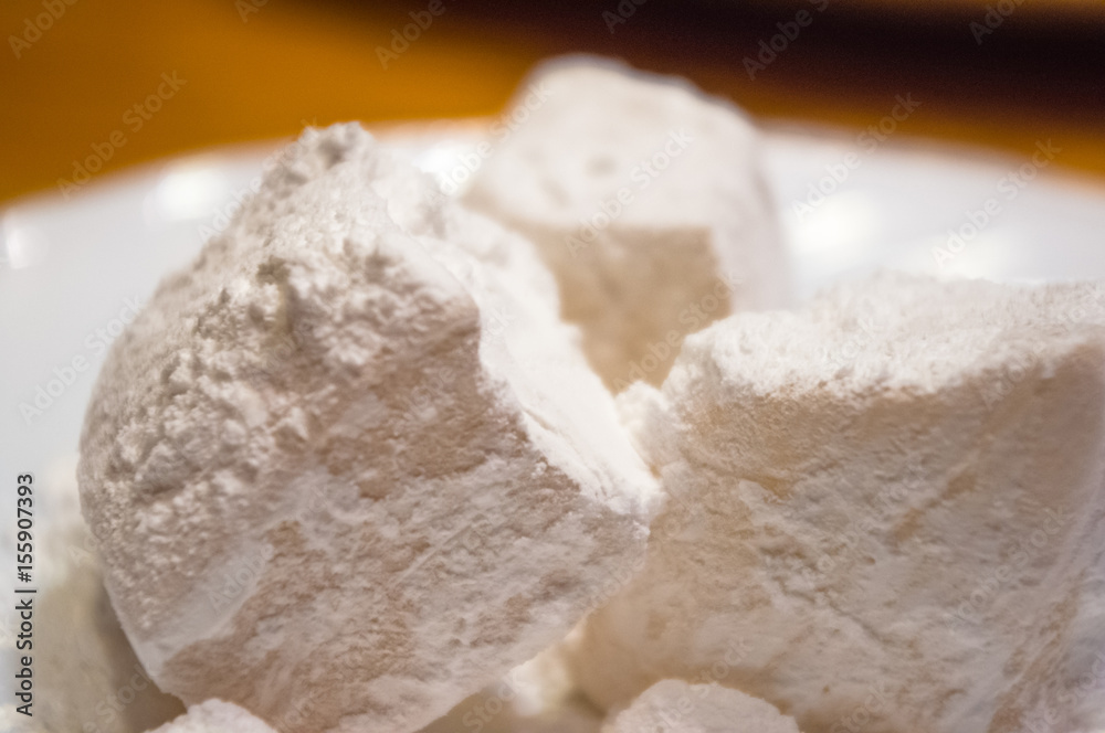 Turkish delight or rahat-lokum on a white saucer Turkish delight or rahat-lokum on a white saucer