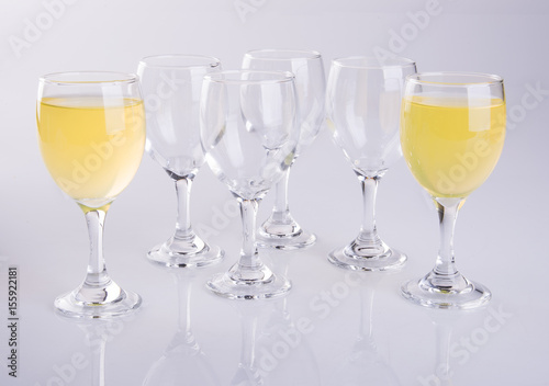 Orange juice in glasses on white background.
