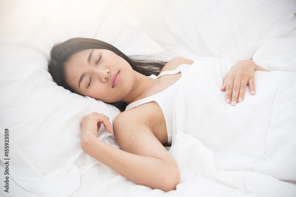Asian beautiful woman sleeping on her bed. Asian beautiful woman sleeping on her bed.