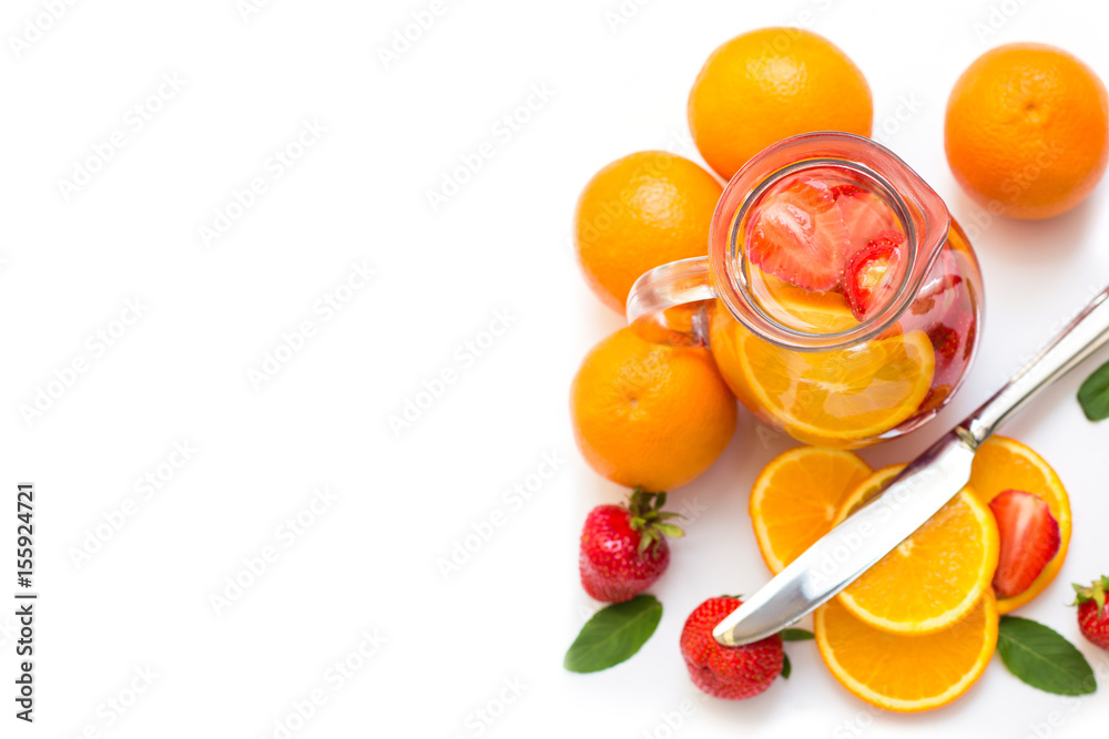 Strawberries, oranges and mint for a drink . Strawberries, oranges and mint for a drink .