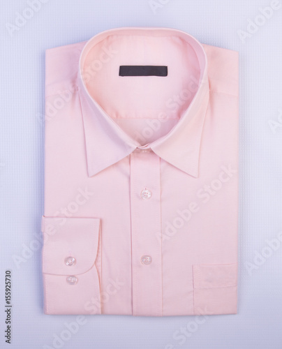 Shirt or men dress shirt on background.
