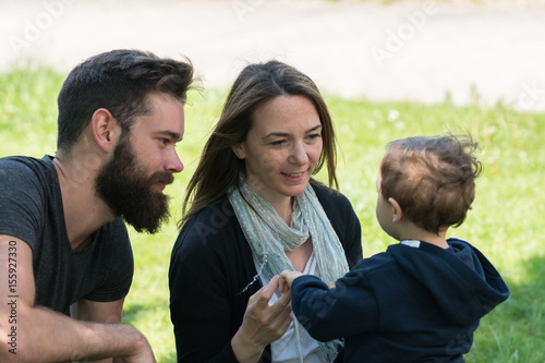 Happy family in park © cineberg
