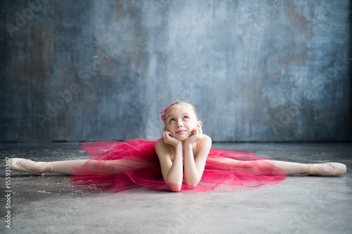 little ballerina doing splits and dreams of future success