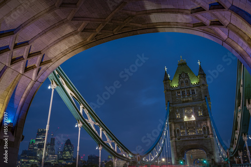 Traffic on Tower bridge at night  London  England