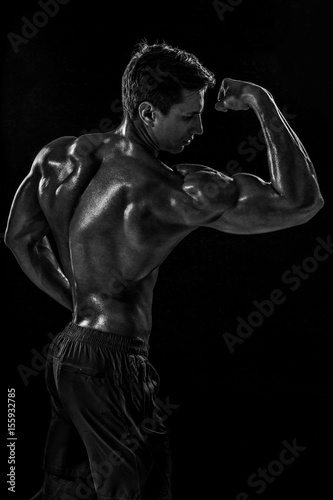 Strong Athletic Man Fitness Model posing back muscles, triceps o © nazarovsergey