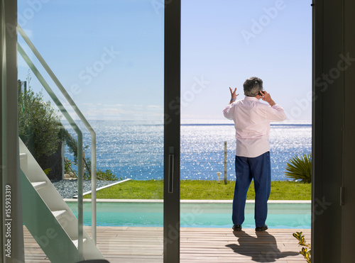 Mature man on the mobile outdoors © Image Source RF