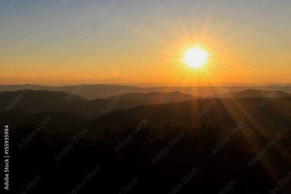 Orange sunset over the appalachian mountains.