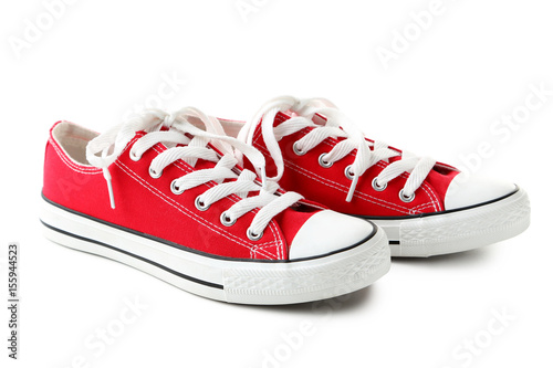 Pair of red sneakers isolated on a white