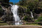 beautiful nature background of waterfall on mountain