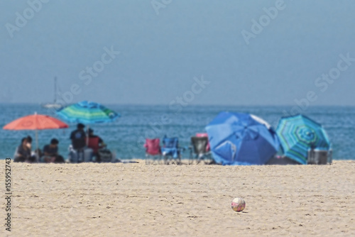 Umbrellas on a sandy beach near the ocean