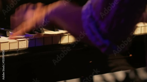 Grand piano: playing staccato chords - Close up photo