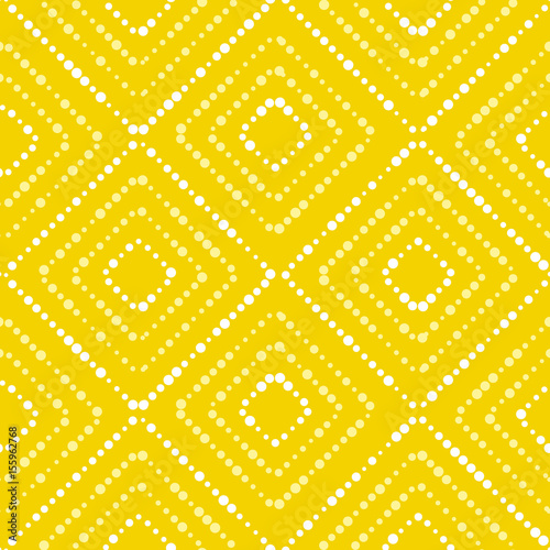 White and yellow paint dot setter concept summer seamless pattern.Modern dynamic abstract repeatable motif in summer sunny color. 