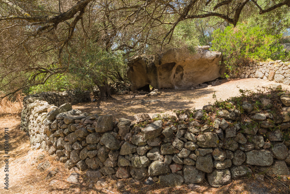 The island of Sardinia, Italy. Arzachena: ruins of rural megalithic buildings of the complex Nuraghe Albuccio, around 1600 BC The island of Sardinia, Italy. Arzachena: ruins of rural megalithic buildings of the complex Nuraghe Albuccio, around 1600 BC