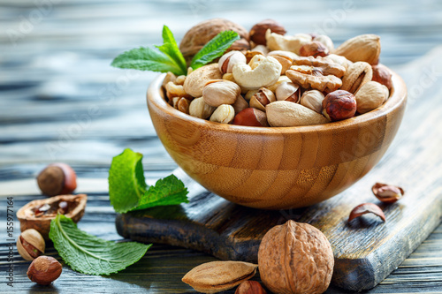 Mix nuts in a bowl closeup. photo