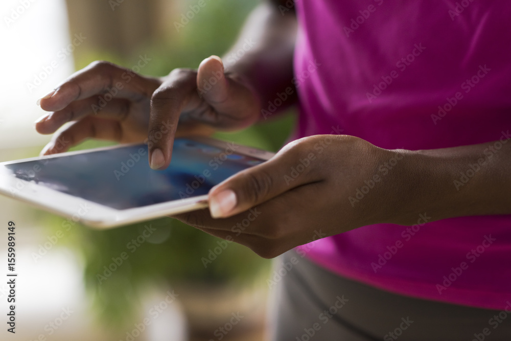 african american woman using tablet
