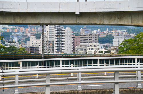 Highway In Hiroshima Japan With Houses On The Background