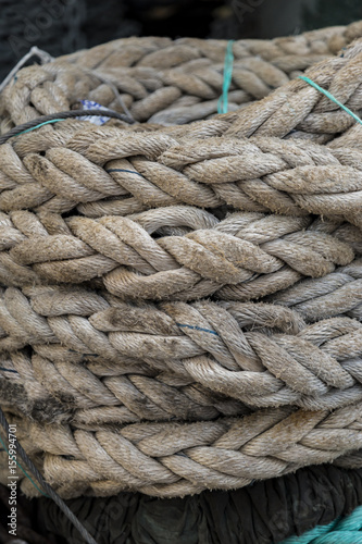 Closeup view to stacked and knotted old rope