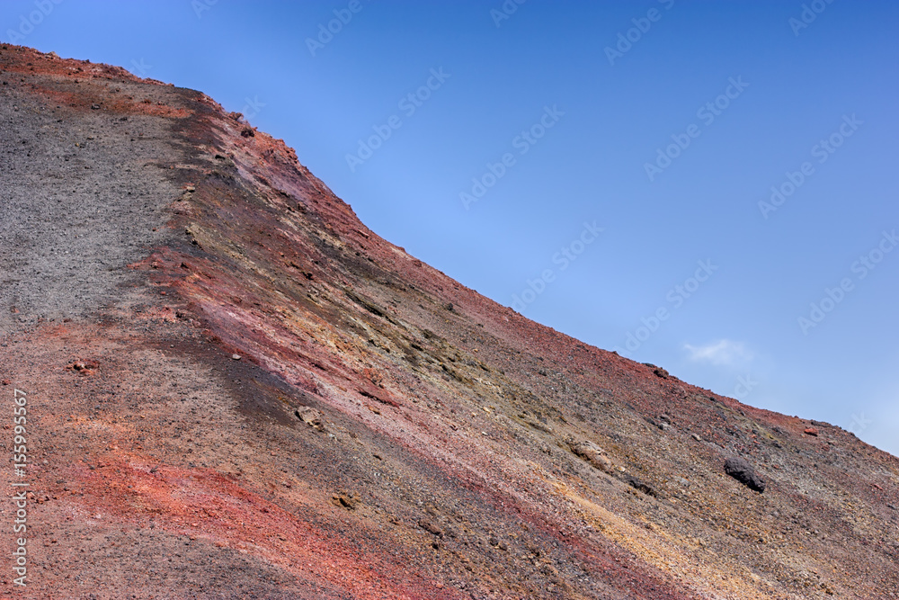 Fototapeta premium Red rocks slope of Etna - tallest active volcano in Europe. Sicily, Italy