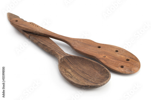 Old wooden spoon on a white background