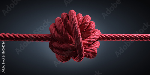 Großer Knoten in rotem Seil