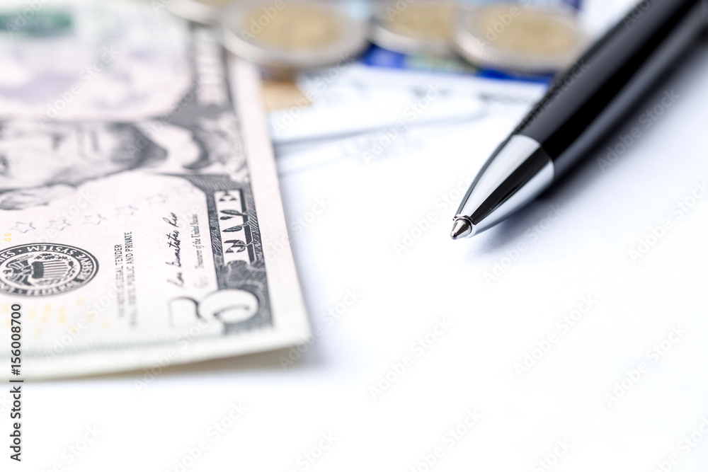 Payment cards, money and bills as payment concepts, banking, household bills. Shallow depth of field. Payment cards, money and bills as payment concepts, banking, household bills. Shallow depth of field.