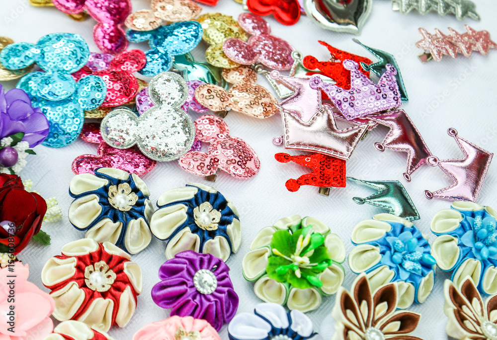 A set of different colored hair-pins and scrunchies