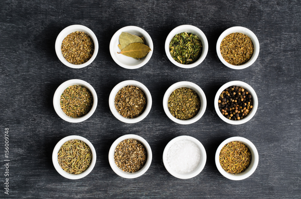 Overhead of Dried Herbs and Condiments in Bowls