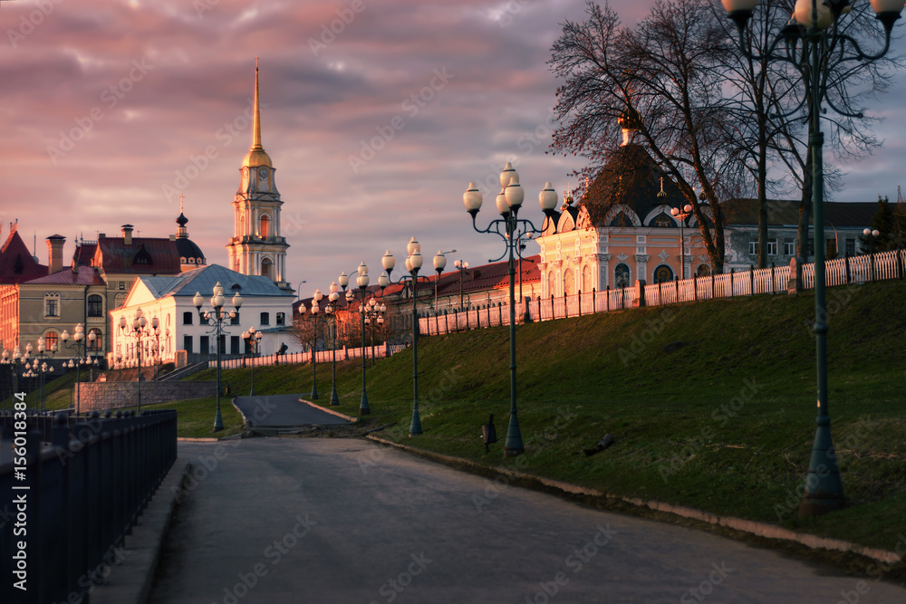 Russia, the embankment of the Volga River and the building of the Rybinsk Museum-Reserve at sunset. City landscape