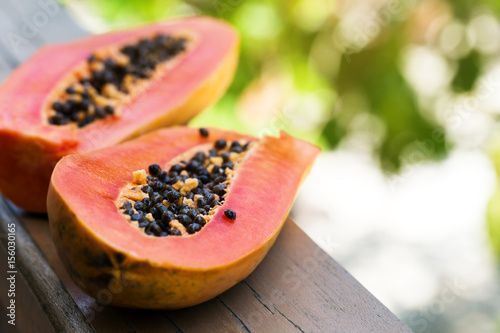 Slices of fresh cutted papaya photo