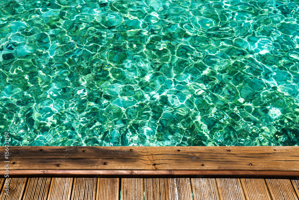 Wooden pier with crystal water
