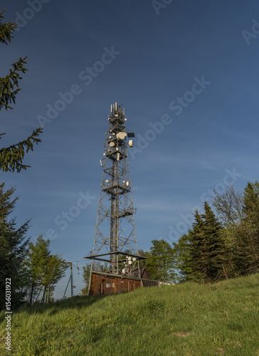 Transmitter on Jedlova hill with blue sky photo