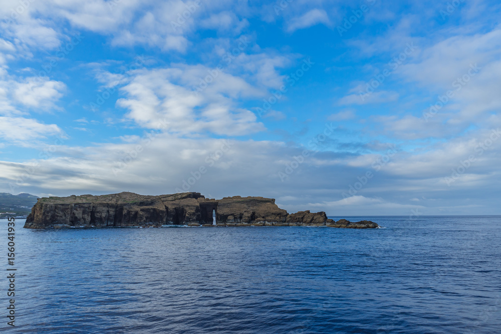 Rocks in Atlantic Ocean near Pico and Faial Islands, Azores, Portugal