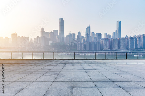 cityscape and skyline of chongqing from empty brick floor photo