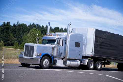 Big classic semi truck rig tall pipes custom trailer black