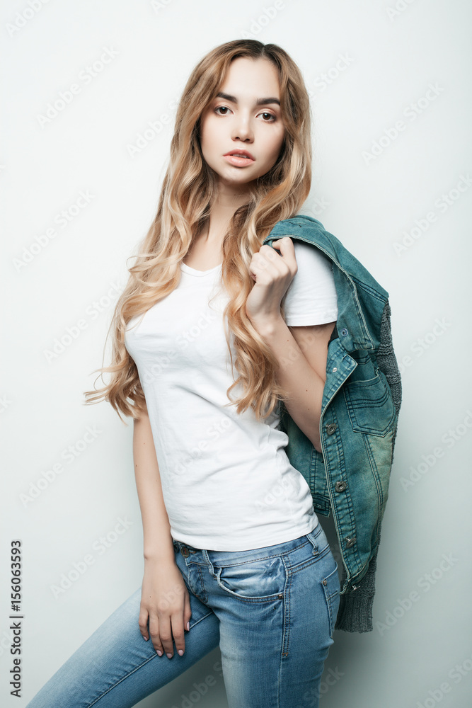 Young fashion model posing in studio Young fashion model posing in studio