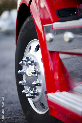 Big wheel aluminum reflection bolts rims red semi truck photo