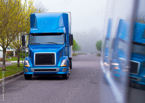 Slika na platnu Modern semi truck blue shiny color of professional big rig