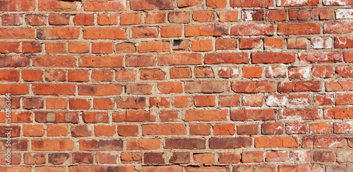 Vintage red brick wall. Simple brick wall background or texture.