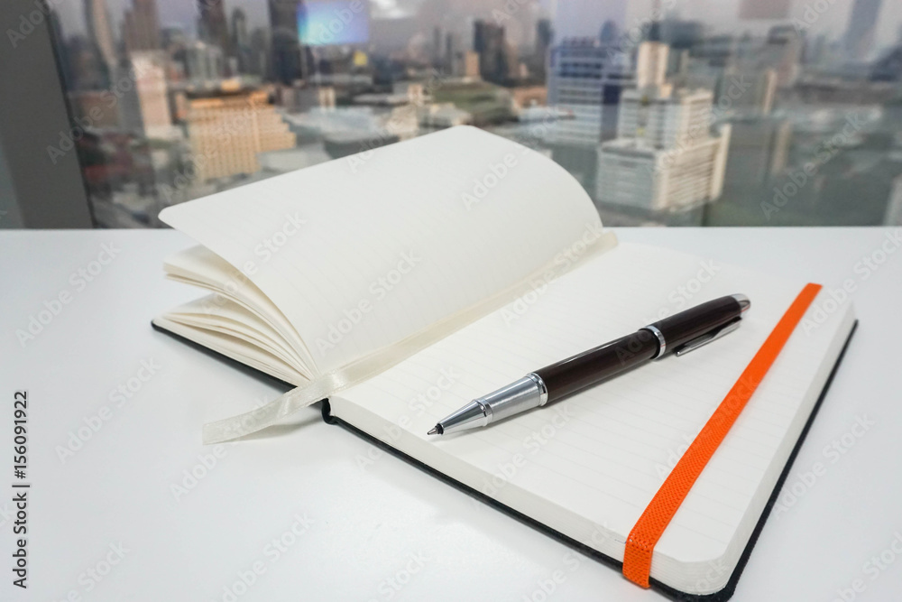 mock up notebook and pen for taking business meeting in office mock up notebook and pen for taking business meeting in office