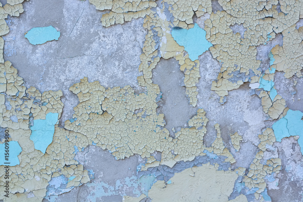 Blue cracked painting on old plaster wall surface Blue cracked painting on old plaster wall surface