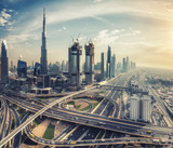 Spectacular skyline of Dubai, UAE.  Futuristic modern architecture of a big city at sunset. Aerial view.