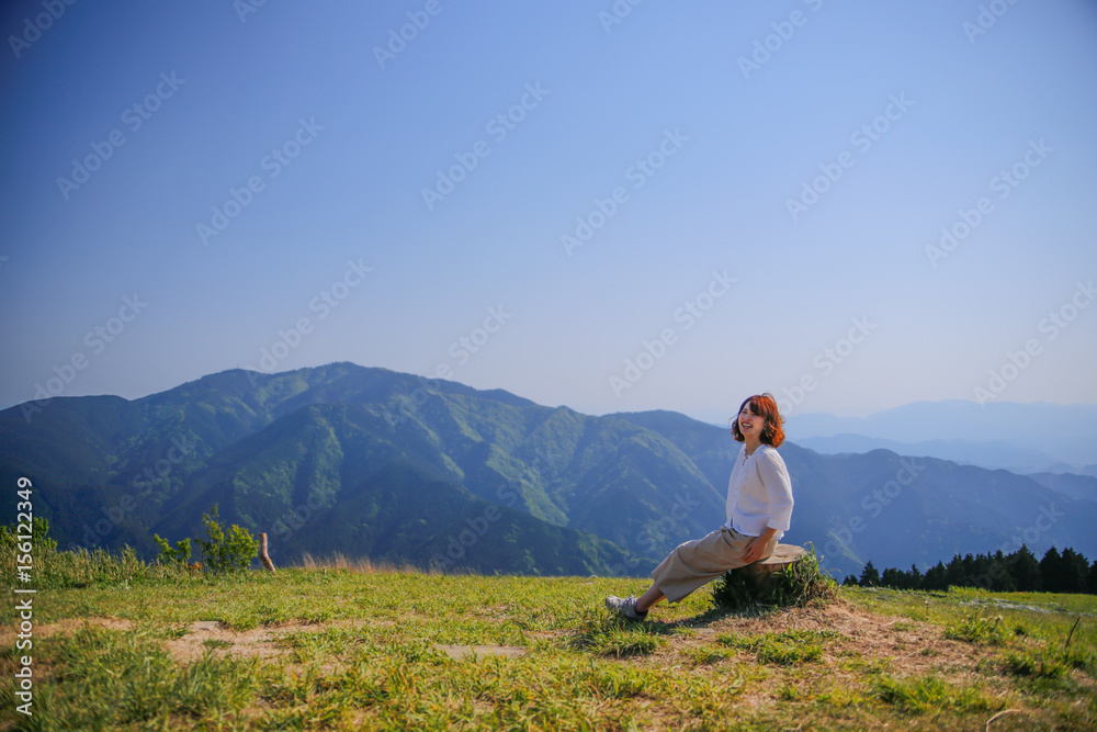 Japanese woman on green mountain Japanese woman on green mountain