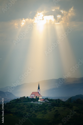 Fotobehang Sun rays shining down on a Church