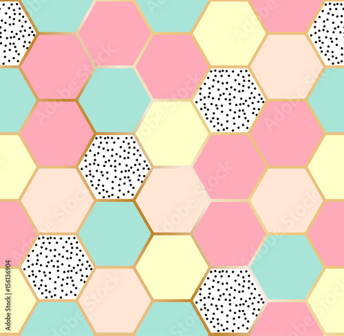 Vector geometric seamless repeating pattern with hexagonal honey comb shapes in pastel colors in golden structure.