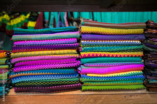 Colorful Burmanese fabric in market at Inle lake, Myanmar photo