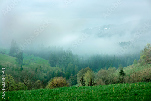 Landscape of great mountains in spring in the cloudy day