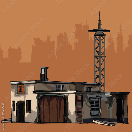 old dilapidated two-story building with a metal tower
